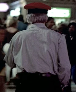 Gerald Demus Security Guard.jpg (166 KB) Demus disguised as a security guard