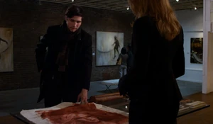 Hughes presenting his art.