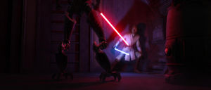 Maul corners an exhausted Obi-Wan who prepares to attack him.