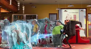 Gru freezes people to buy time.