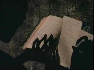 SNg5FsYfjbJAKkjFAoyiPpt46kc@508x381.jpg (44 KB) The Humanoid tearing pages from a book.