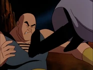 Ubu subdued by Batman