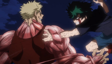 Muscular battling Midoriya.