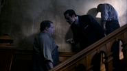 Whitman scolding Dexter for warning off victims.
