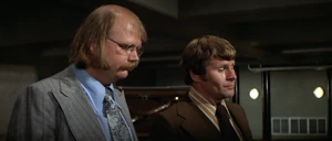 Wint and Kidd preparing to kill Bond for a second time.