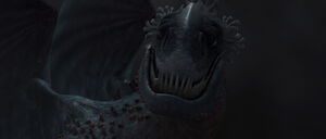 Red Death angrily scans the dark sky, but Hiccup and Toothless are nowhere to be seen.
