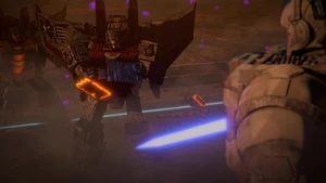 Starscream howls in anger at Jetfire for cutting off his hand.