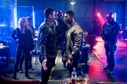 John Diggle, Jr. confronting Connor Hawke and the team
