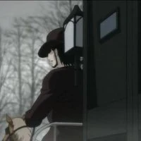 Amshel riding a carriage containing a sleeping Diva.