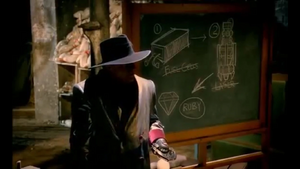 Claw briefing his henchmen