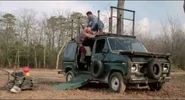 The Lawnmower Backing Away From The Van