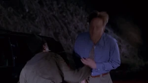 Charlie beating Nick up