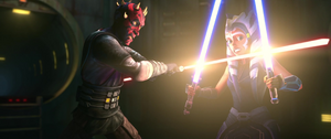 Ahsoka and Maul activate their lightsabers and briefly duel.