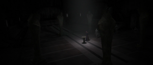 Inside the LiMerge building with Sith statues lining the room, Sidious and Tyranus enter.