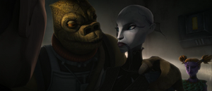 Bossk explains how she killed Oked and blackmailed her into taking the job.