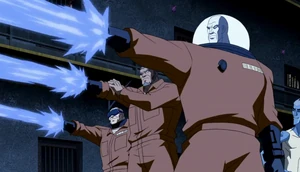 Mr. Freeze and the other ice-villains attacking the wall.