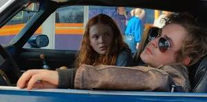 Billy in the car with Max.