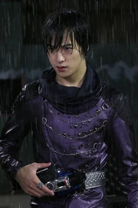 Chase about to transform into Kamen Rider Chaser.