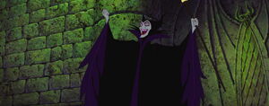 Maleficent laughing hysterically.