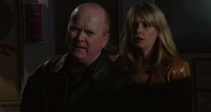 Phil defends Sam when they get confronted by Johnny over his conflict against the Mitchell Family (2005).