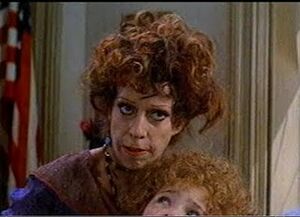 Carol Burnett as Miss Hannigan in the 1982 film.