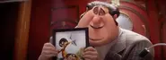 Young Mr. Perkins meeting Gru and Wild Knuckles in Minions: The Rise of Gru.