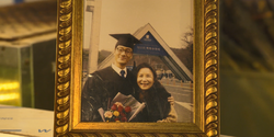 Sang-woo with his mother during his graduation at Seoul National University.