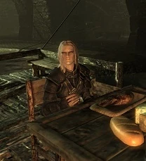 Vex sitting at the table.