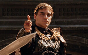 Commodus giving the thumbs-up, sparing Maximus.