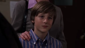 Jake O'Hara reveals his true nature to Henry's grieving father, Brett Morton, by delivering an insincere apology over Henry's murder and indirectly taunting him over it.