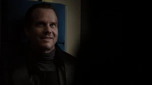 Garrett grinning sadistically after witnessing Ward betray S.H.I.E.L.D. and kill Victoria Hand.