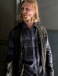 Dwight holding Daryl's crossbow.