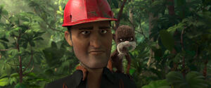 The logging Foreman looks at Linda and Tulio