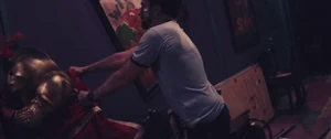 The Janitor pummeling Knighty to the wall.