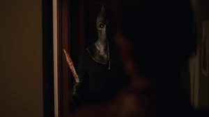 Cam Henry as The Executioner.