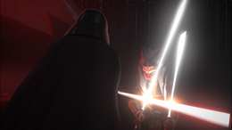 Vader swipes underneath Tano's blades locking it.