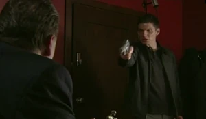 Jack Dalton held at gunpoint by Dennis.