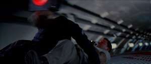 Payne meeting his death through decapitation by a subway light.