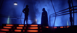 Luke and Vader have a stare down before the duel begins.