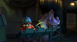 Randall sadistically grins as the machine inches towards Mike...