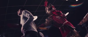 Knighty Knight stabbing Aaron from behind.