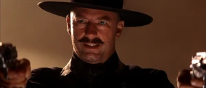 Van Cleef confronting Roy and Wang in the church.