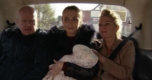 Phil and Lisa help Louise leave the square with her baby, Peg, in 2020.