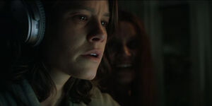 The Smile Entity terrorizing Rose.
