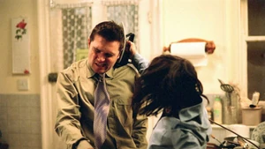 Trevor is shocked when Little Mo attacks him with an iron after attempting to rape her in a fit of rage.