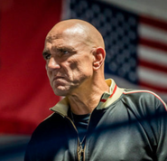 Albi looking stern at Reggie Bogdani.