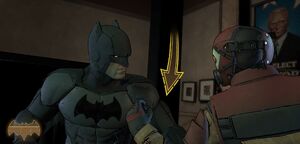 Batman engages the lead mercenary in melee combat at City Hall.