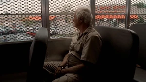 Feech looks out at the freedom he's now lost forever.