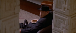 Lothar relaxing in Sinclair's mansion.