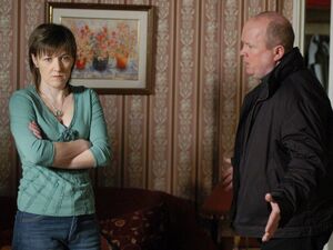 Phil Mitchell confronting Kat's younger sister Little Mo Slater over her ill-fated marriage with Billy as well as being told that she allegedly hit Ben during an argument.